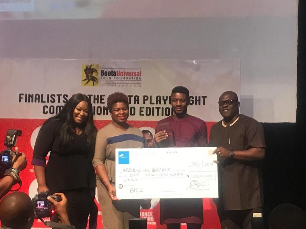 Abdul-Qudus collecting his prize
