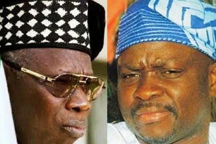 Governor Ayo Fayose of Ekiti State (pictured right) and former President Olusegun Obasanjo (pictured left)