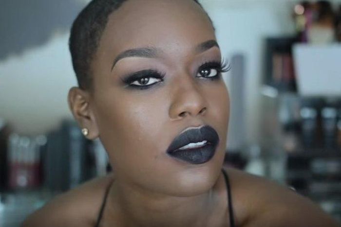 Destiny Godley wears a dark makeup look