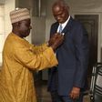 Minister of Power , Works and Housing , Mr Babatunde Fashola SAN (right) being decorated with the Armed Forces Remembrance Day Celebration Emblem 2016 by the National Chairman, Nigerian Legion, Colonel Micah Gaya (retd.) at the Honourable Minister’s Of...