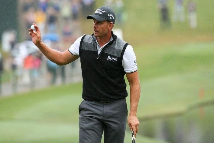Sep 25, 2015; Atlanta, GA, USA; Henrik Stenson reacts after putting the eighteenth green during the second round of the Tour Championship by Coca-Cola at East Lake Golf Club. Mandatory Credit: Jason Getz-USA TODAY Sports