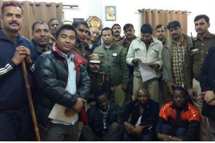 The three Nigerians sitting