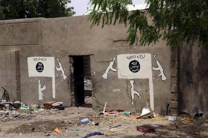 A wall painted by Boko Haram is pictured in Damasak March 24, 2015. REUTERS/Joe Penney