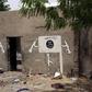 A wall painted by Boko Haram is pictured in Damasak March 24, 2015. REUTERS/Joe Penney