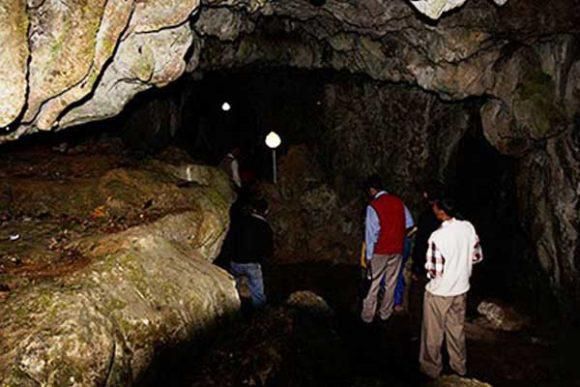 Tourists entrying the Arochukwu Cave [Hometown.ng]