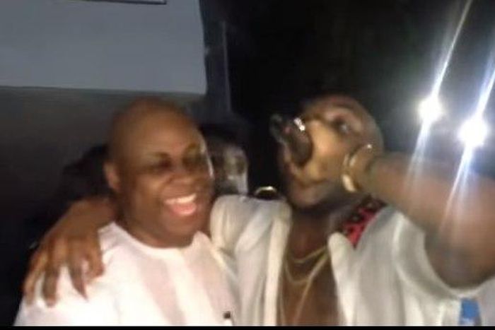 Davido and his dad on stage in Gambia