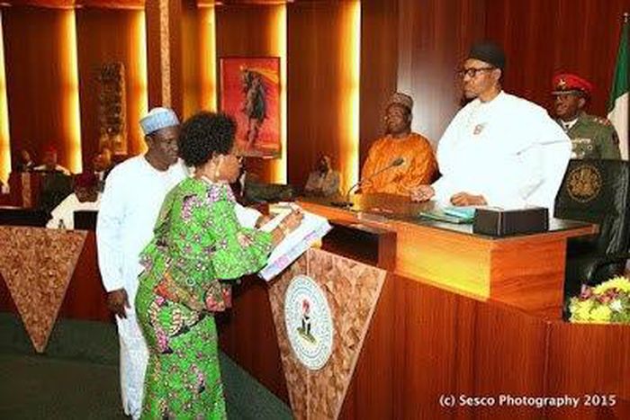 President Muhammadu Buhari swears in Head of Service, Winifred Oyo-Ita in Abuja on January 6, 2016