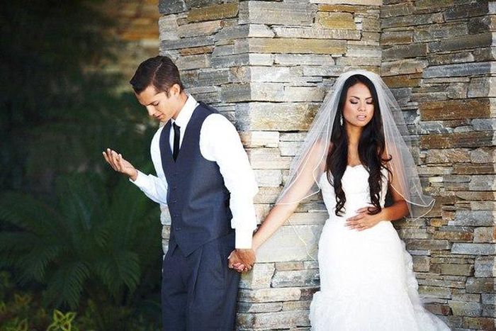 A couple praying together