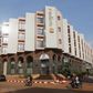 People drive motorcycles past the Radisson Blu hotel in Bamako, Mali, November 22, 2015.