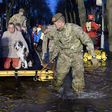British PM Cameron chairs emergency meeting as thousands affected by floods