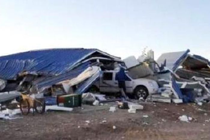 Masked attackers destroy security checkpoint in China