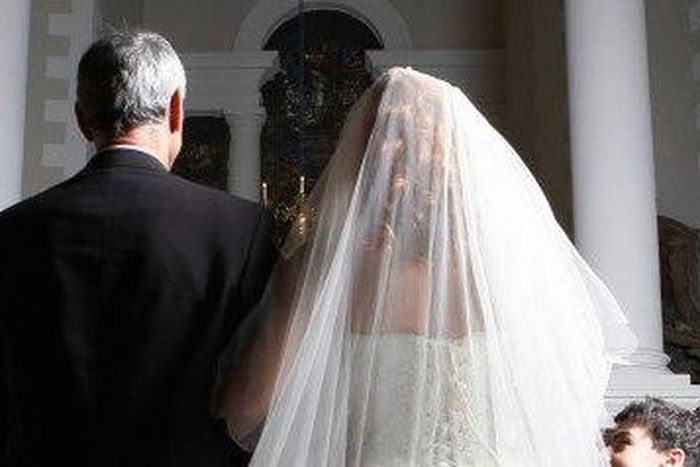 Father walking his daughter down the aisle