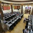 Traders work at the Egyptian stock exchange in Cairo, Egypt in this August 23, 2015 file photo REUTERS/Mohamed Abd El Ghany/Files