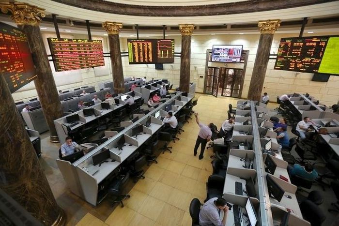 Traders work at the Egyptian stock exchange in Cairo, Egypt in this August 23, 2015 file photo REUTERS/Mohamed Abd El Ghany/Files