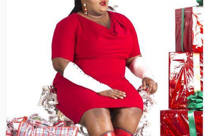 Eniola Badmus, in a Santa Clause demeanor.