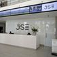 People walk near the reception at the Johannesburg Stock Exchange (JSE) in Sandton, Johannesburg, South Africa December 10, 2015. REUTERS/Siphiwe Sibeko