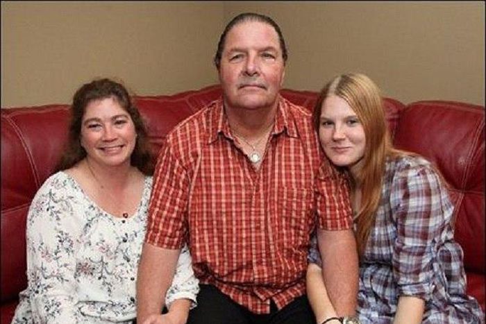 Rev. Thom Miller and his wives are happy together