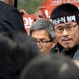 South Korea labour boss turns himself in weeks after violent rally