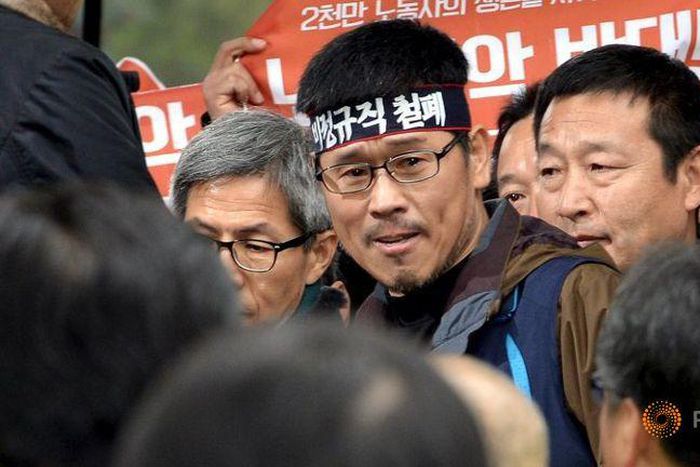 South Korea labour boss turns himself in weeks after violent rally