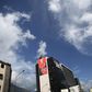 A banner (in red) with the images of Venezuela"s President Nicolas Maduro and late Venezuelan President Hugo Chavez, is pictured on a wall of a building in Caracas, December 5, 2015.
