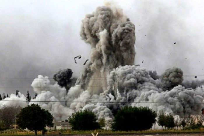 U.S.-led troops launch 15 air strikes against ISIS