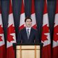 Canada PM brushes off critics, says to stick course on refugees