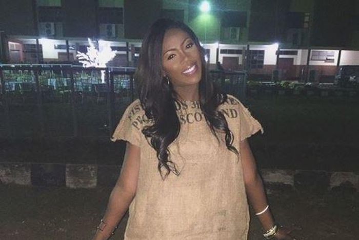 Tiwa Savage in a sack of rice