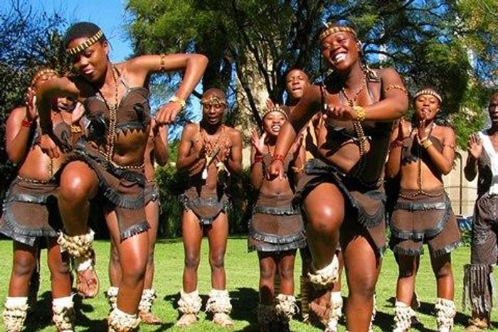 The poet compares his love for South Africa, to the love he has for some other person.