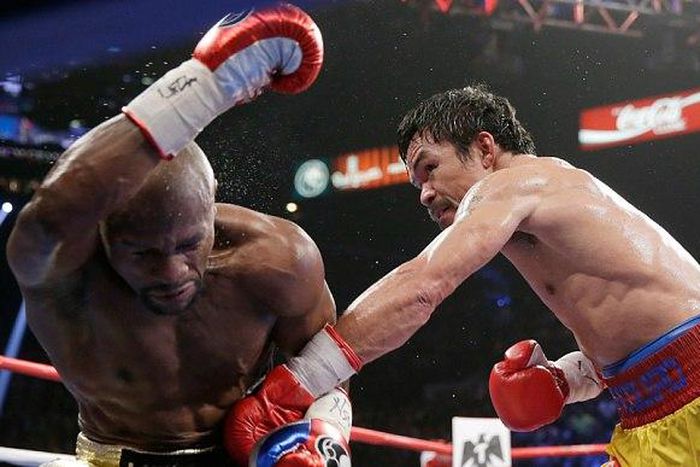 Pacquiao hits hard at Mayweatherin this round