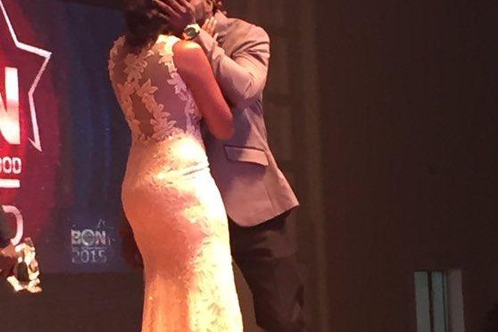 Seun Akindele and Roseanne Marcel sharing a kiss at the 2015 Best of Nolywood Awards