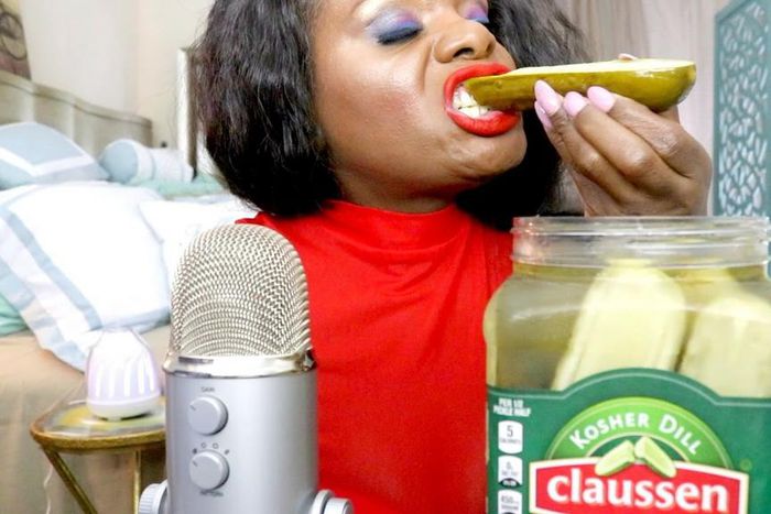 ASMR star Spirit Payton eating a pickle [Youtube/spiritpayton]