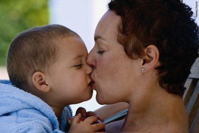 Kissing babies on the lips