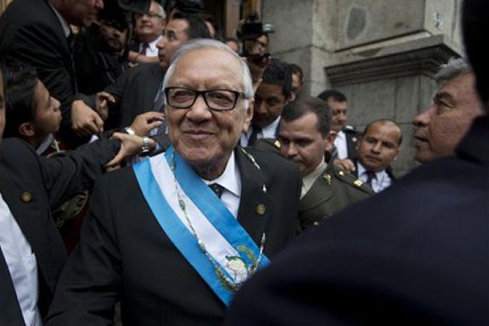 The new Guatemalan President-Alejandro Maldonado, with security details.