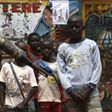 Children look at a soldier from the newly deployed EUFOR-RCA European Union military operation in the Central African Republic, patrolling along a street in Bangui May 8, 2014. REUTERS/Emmanuel Braun