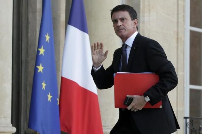 French PM warns of more attacks as police raid suspected Islamist homes