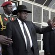 South Sudan's President Salva Kiir Mayardit (L) gestures as he leaves after attending peace talks with the South Sudanese rebels in Ethiopia's capital Addis Ababa, March 6, 2015. REUTERS/Tiksa Negeri