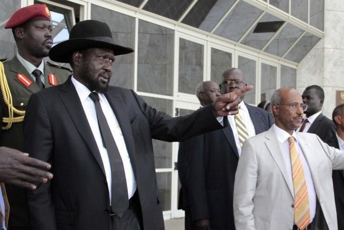 South Sudan's President Salva Kiir Mayardit (L) gestures as he leaves after attending peace talks with the South Sudanese rebels in Ethiopia's capital Addis Ababa, March 6, 2015. REUTERS/Tiksa Negeri