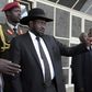 South Sudan's President Salva Kiir Mayardit (L) gestures as he leaves after attending peace talks with the South Sudanese rebels in Ethiopia's capital Addis Ababa, March 6, 2015. REUTERS/Tiksa Negeri