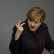 Defiant Merkel vows to stand by refugee policy despite security fears