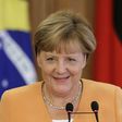 Germany's Merkel condemns "disgusting" violence against refugees