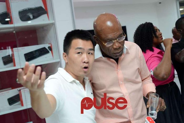 Sam Ojo, Yudala Chariman, with a guest at a Yudala store launch