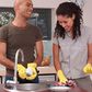 Happy couple doing chores