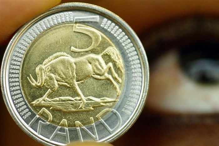 A five rand coin is displayed at the South African Mint in a file photo.