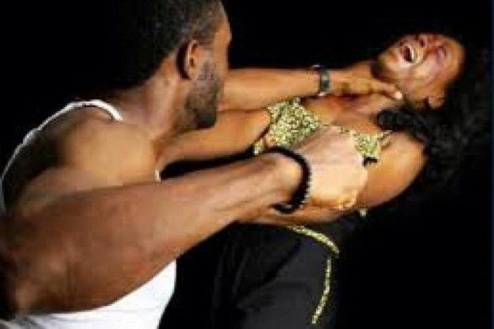 A man beating up a woman