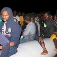 Illegal migrants are seen on a boat that they used, after being detained at a Libyan Navy base in the coastal city of Tripoli September 20, 2015. REUTERS/Hani Amara