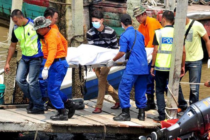 At least 14 killed as boat overloaded with migrants capsizes off Malaysia