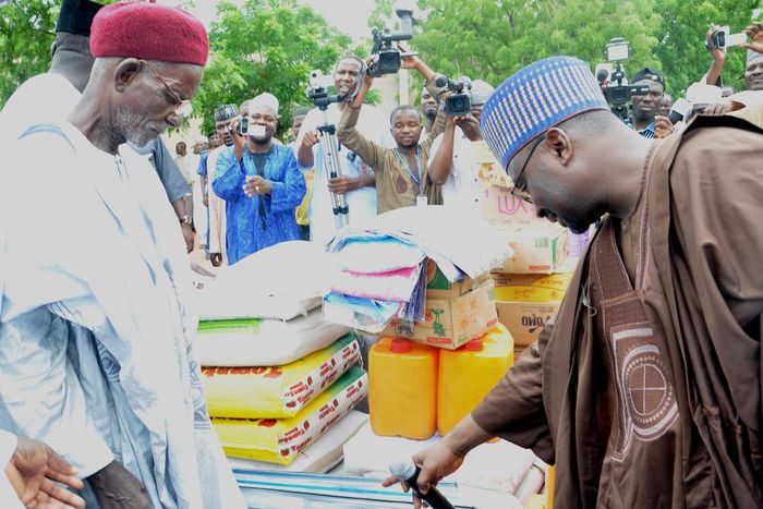 ___4103933___https:______static.pulse.com.gh___webservice___escenic___binary___4103933___2015___8___25___16___PIC.5.+DIRECTOR-GENERAL+OF+NEMA+PRESENTS+RELIEF+MATERIALS+TO+FLOOD++VICTIMS+IN+DAURA