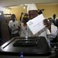 Incumbent president Alpha Conde, leader of Rassemblement du Peuple de Guinea (RPG), casts his vote at a polling station during a presidential election in Conakry, Guinea October 11, 2015. REUTERS/Luc Gnago