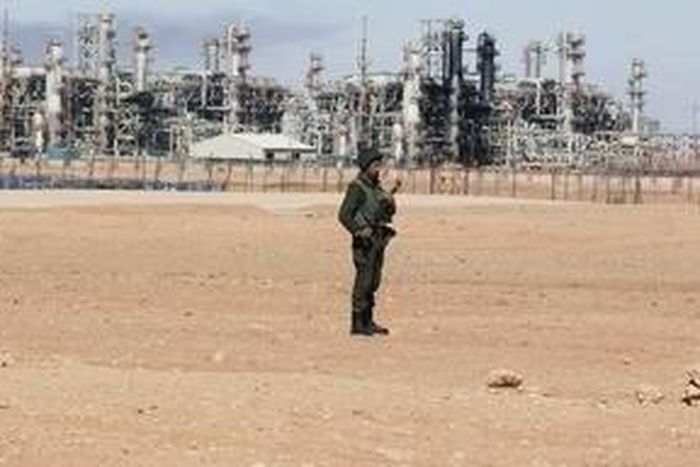 An Algerian soldier stands near the Tiguentourine Gas Plant in In Amenas, 1600 km (994 miles) southeast of Algiers, January 31, 2013. REUTERS/Louafi Larbi
