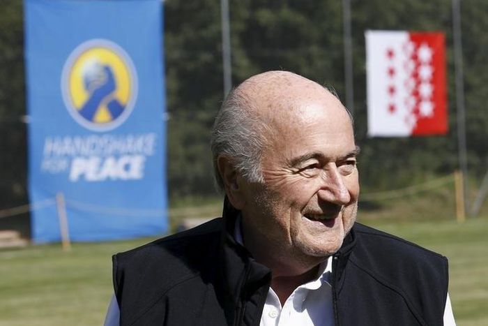 FIFA President Sepp Blatter smiles before the first game of the so-called "Sepp Blatter tournament" in Blatter's home-town Ulrichen, Switzerland, August 22, 2015. REUTERS/Denis Balibouse